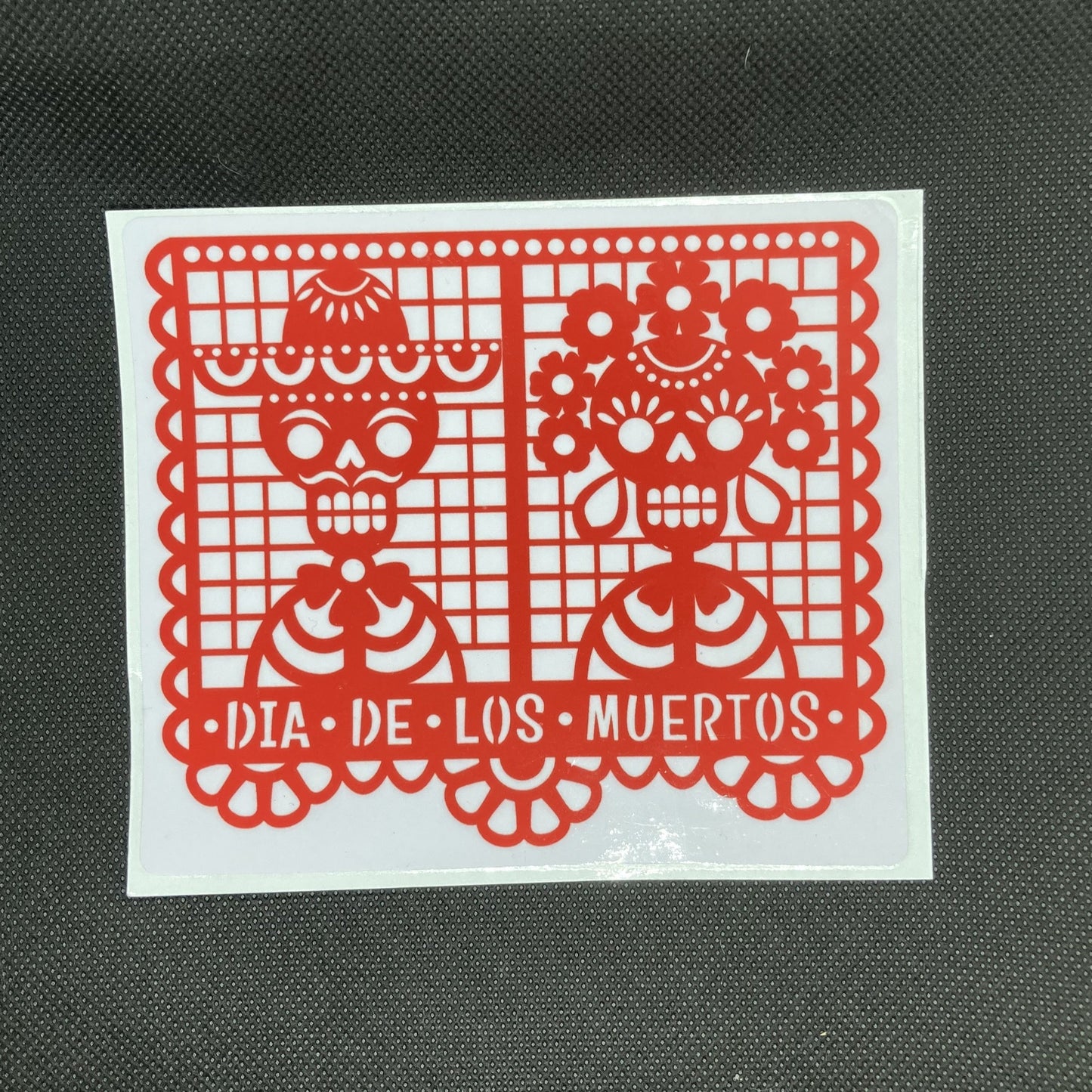 Red day of the dead decal in papel picado style